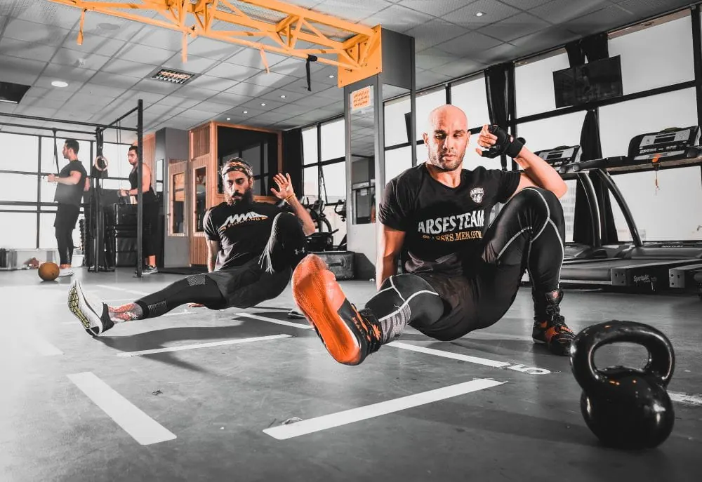 Kettlebell training in a bright home gym built on a budget